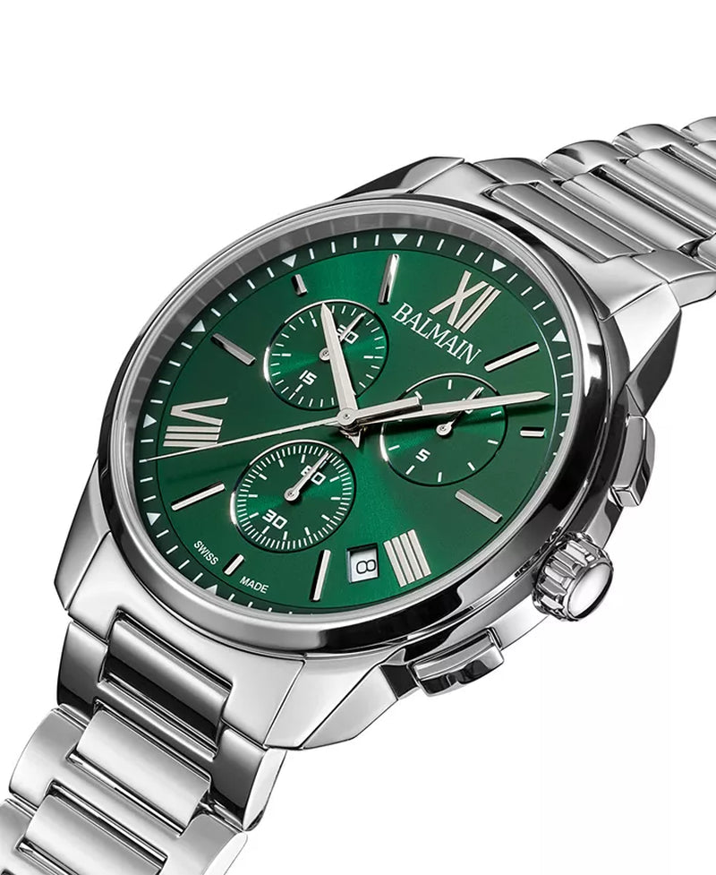 Close up picture of green watch face bevel. pictures from the right with a silver stainless steel band. High resolution.